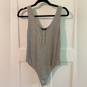 Grey body suit
